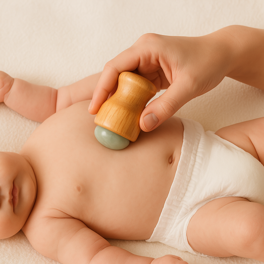 Le massage anti-colique du nourrisson amélioré avec la puissance de la pierre grâce au masseur Bébé Physio